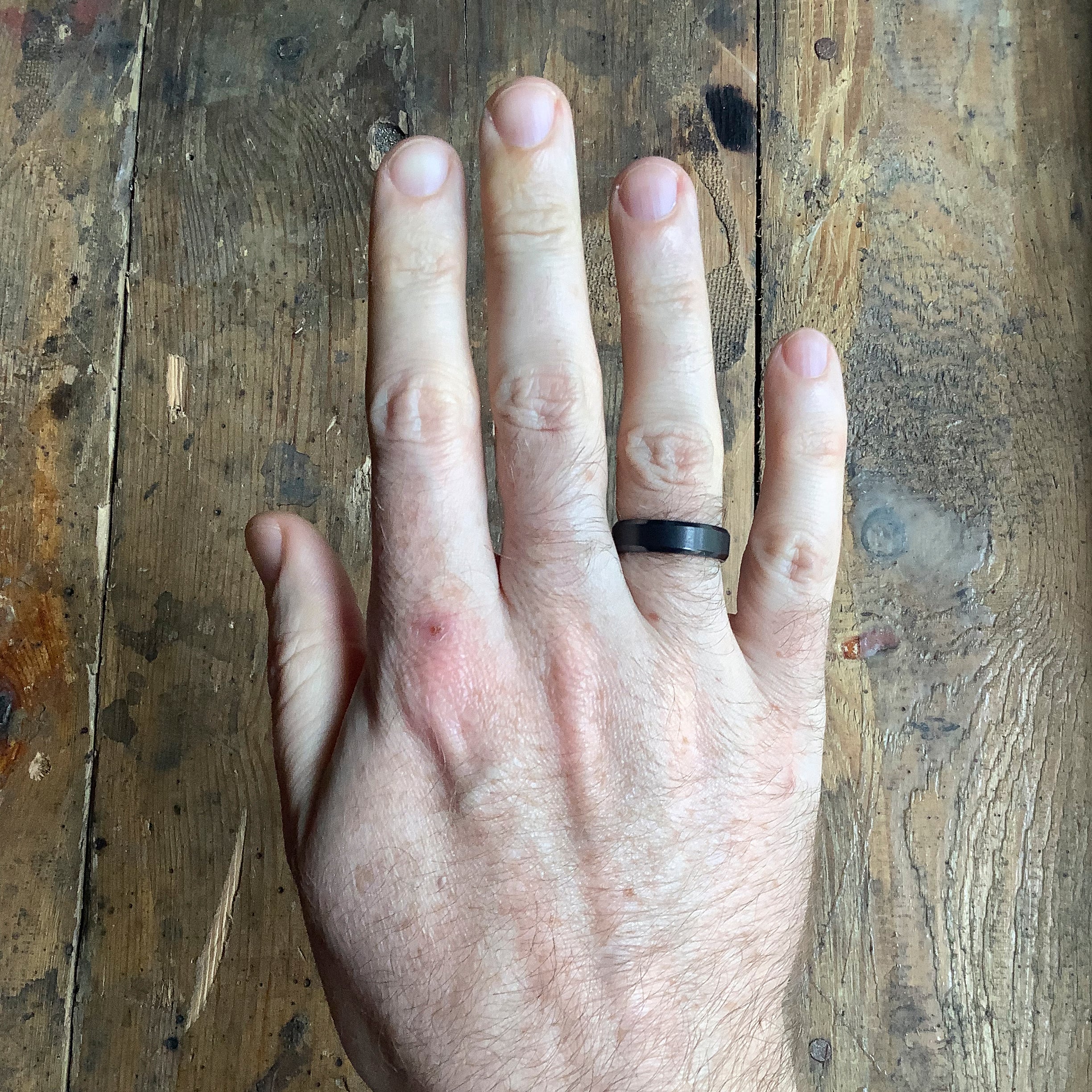 Black ring on on sale wedding finger